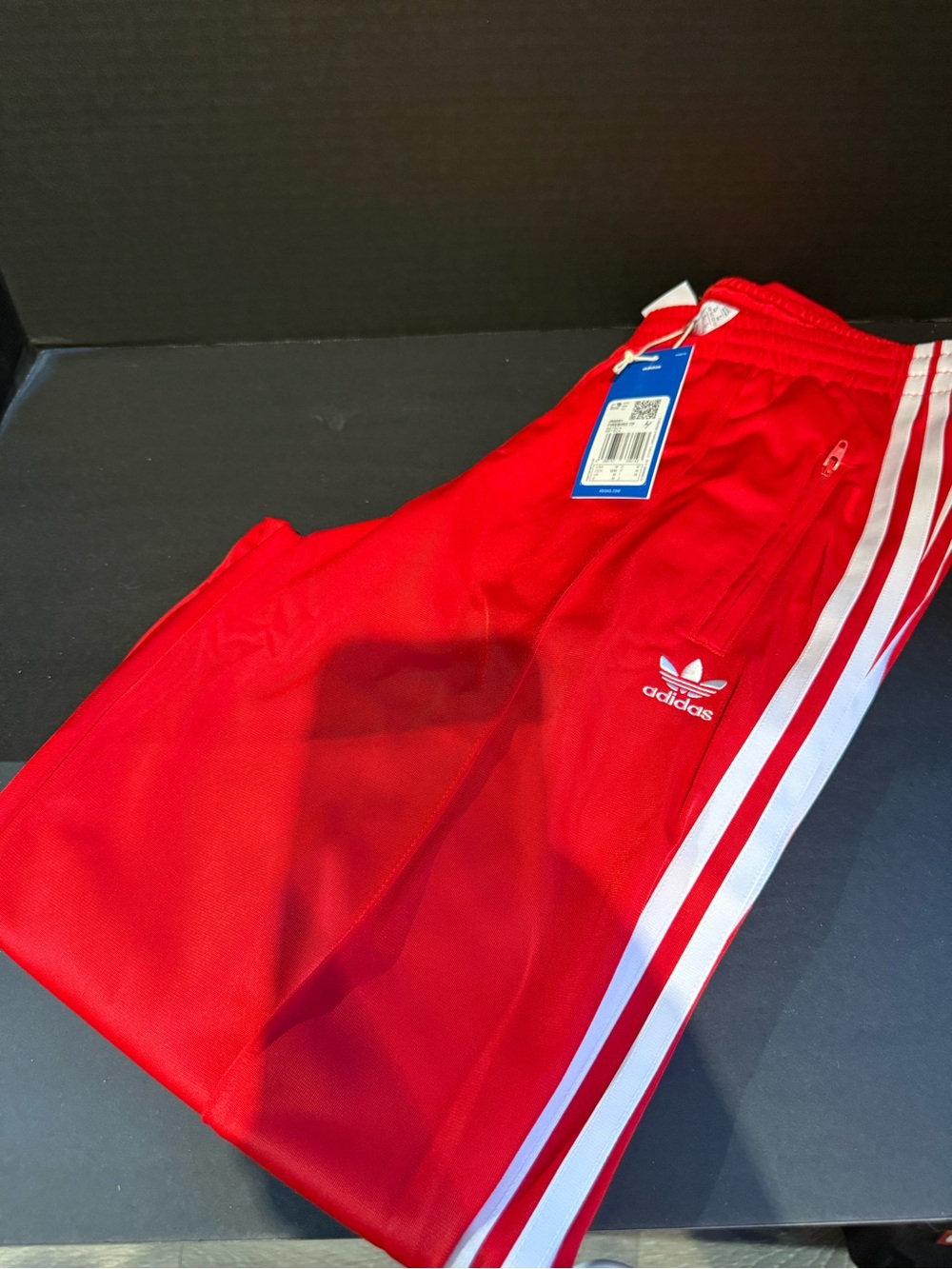 Adidas women’s Red Track Pants with White Stripes size medium
